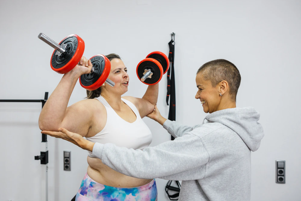 lifting-dumbbells-strength-training-for-losing-belly-fat